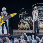 ZZ Top performing live on stage.