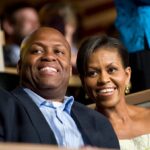 Michelle Obama and her brother Craig Robinson attend the Democratic National Convention in Denver. (Photo by Rick Friedman/Corbis via Getty Images)