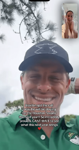 A smiling man on a video call with a woman, announcing that Braxton will play for the Houston Texans.