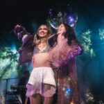 Suki Waterhouse and Camila Morrone appear on stage during The Sparklemuffin Tour