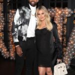 Tristan Thompson and Khloe Kardashian at a birthday celebration.