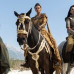 Elayne, Aviendha, and Egwene on horseback in a still from Wheel of Time season 3