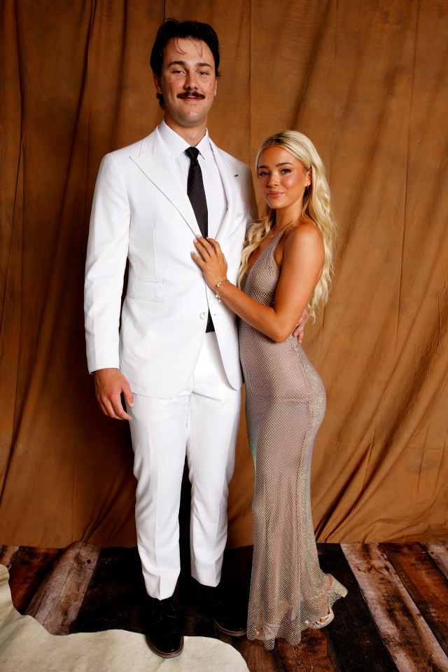 Portrait of Paul Skenes and Livvy Dunne at a red carpet event.