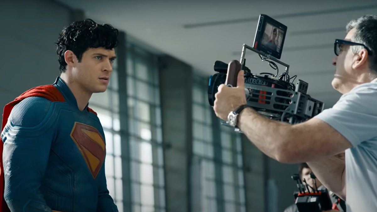 Behind-the-scenes shot of David Corenswet in costume filming Superman.