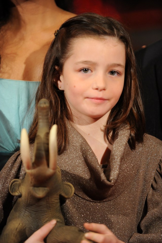 Sophie Nyweide at the Berlin Film Festival premiere of Mammoth, holding a mammoth figurine.