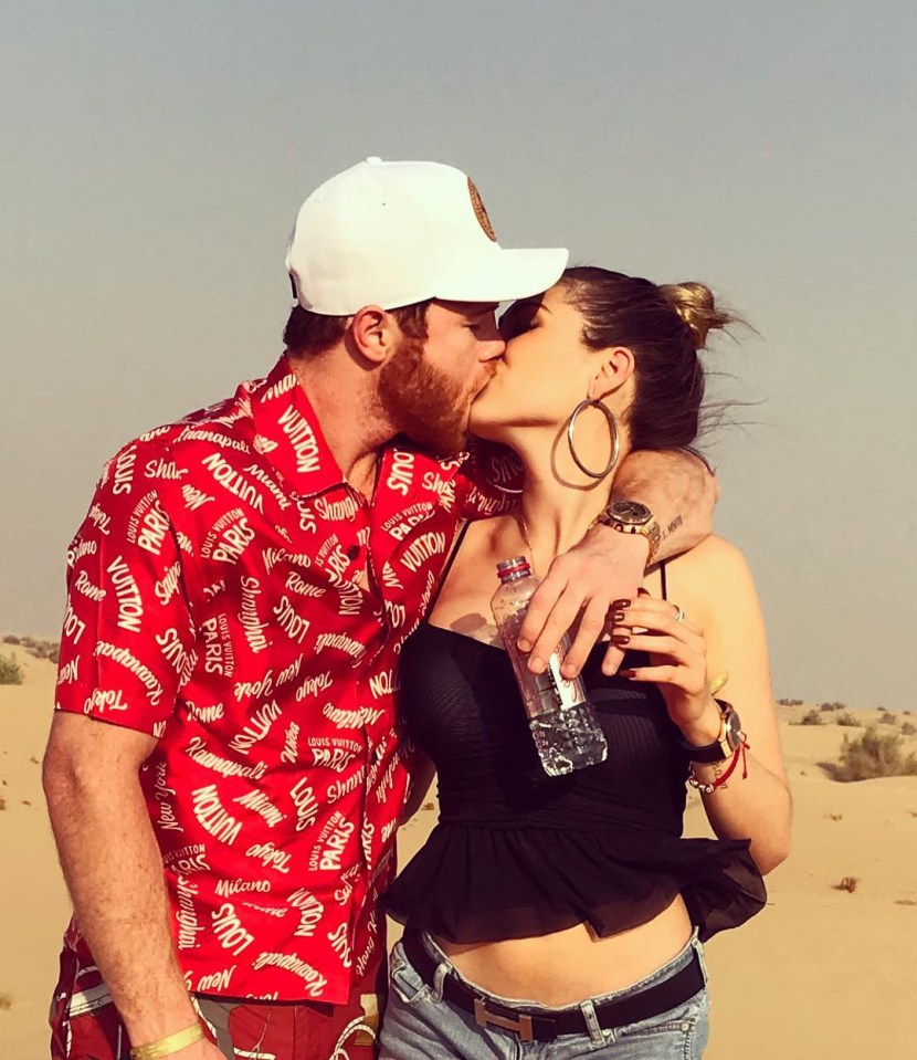 Saul Canelo Alvarez kissing his girlfriend, Fernanda Gomez.