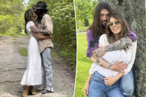 Elizabeth Hurley, Billy Ray Cyrus share steamy kiss as romance heats up