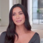 Kim Kardashian in a dark top.