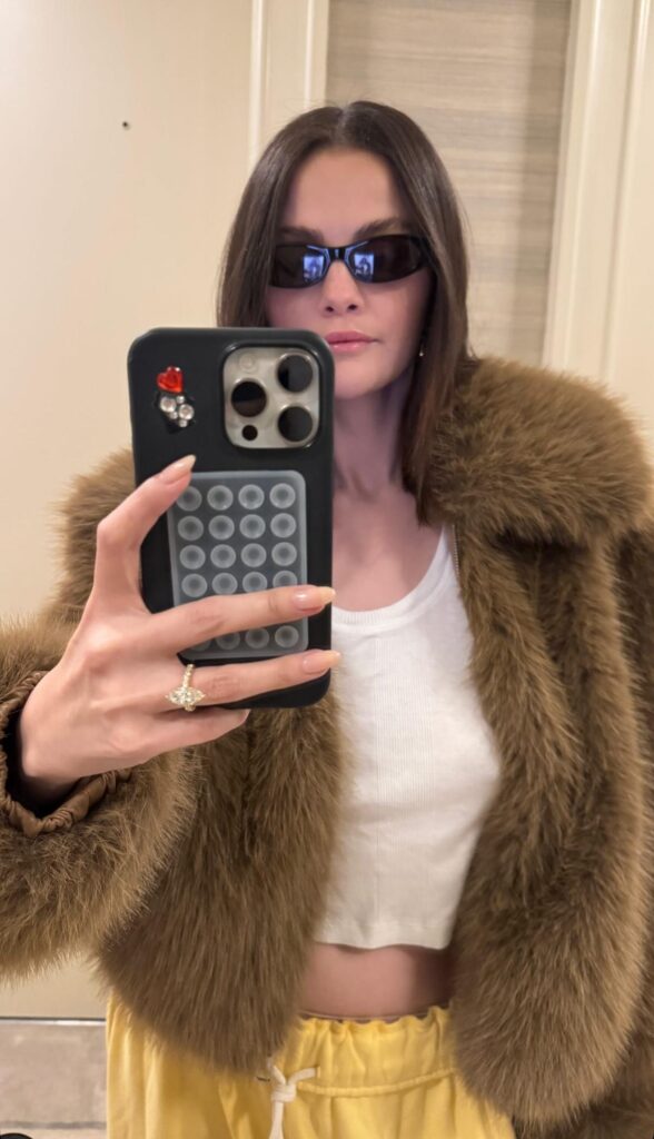 Selena Gomez snaps a selfie.