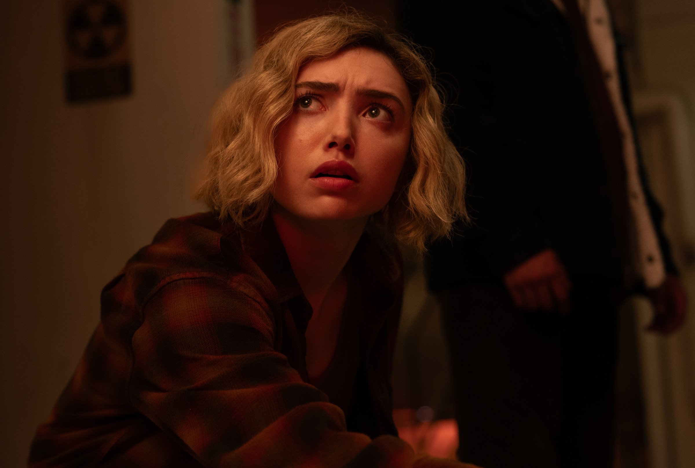 Maddie (Peyton List) looking up and concerned in a still from School Spirits