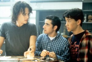 Ledger (left), David Krumholtz (center) and Joseph Gordon-Levitt in a scene from the film.