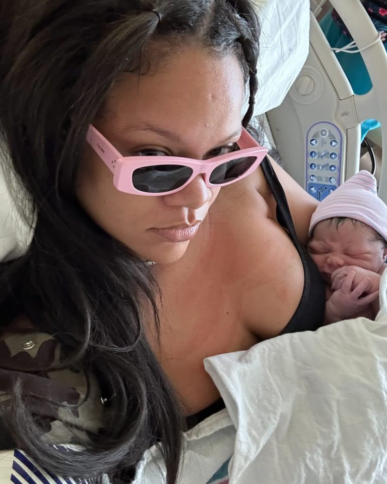 Rihanna holding her newborn baby.