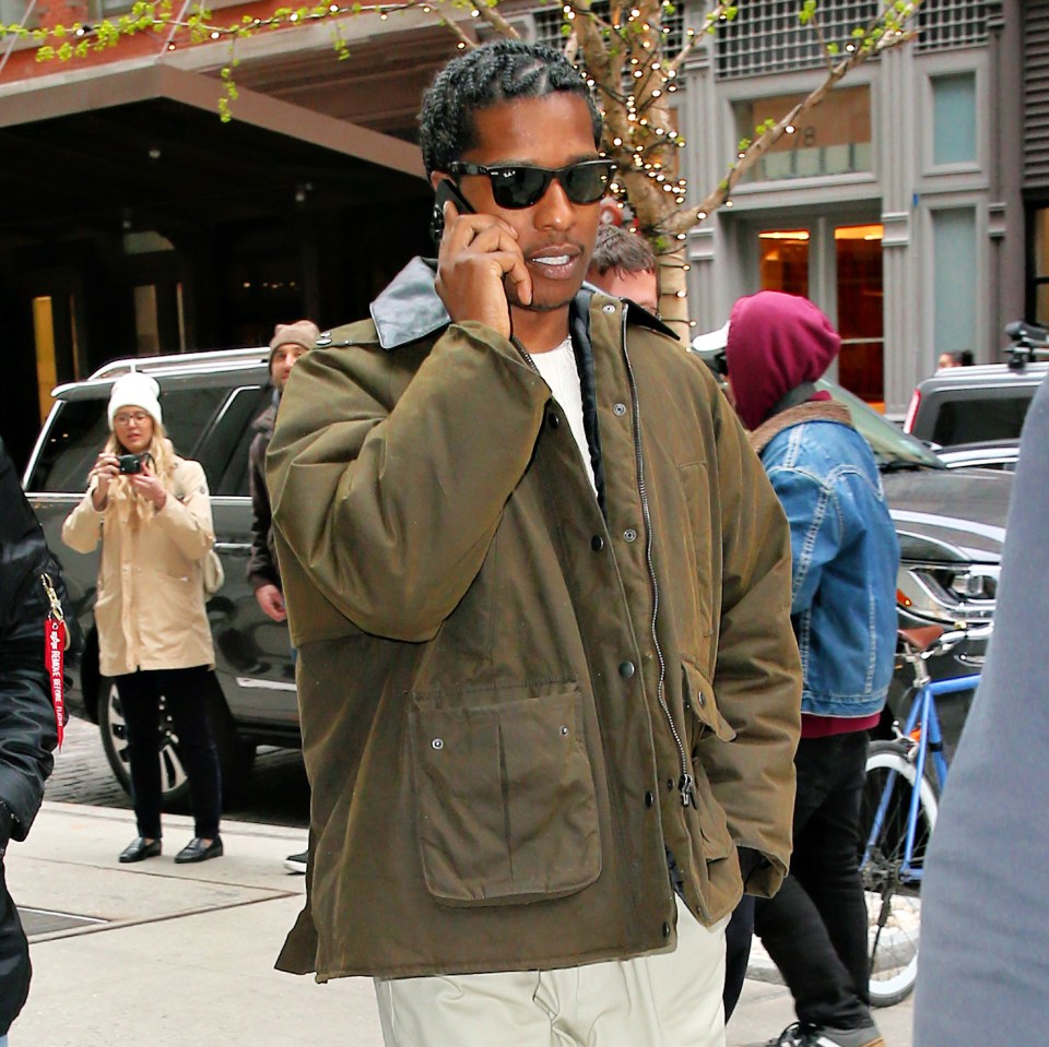A$AP Rocky on a phone call outside the Crosby Hotel.