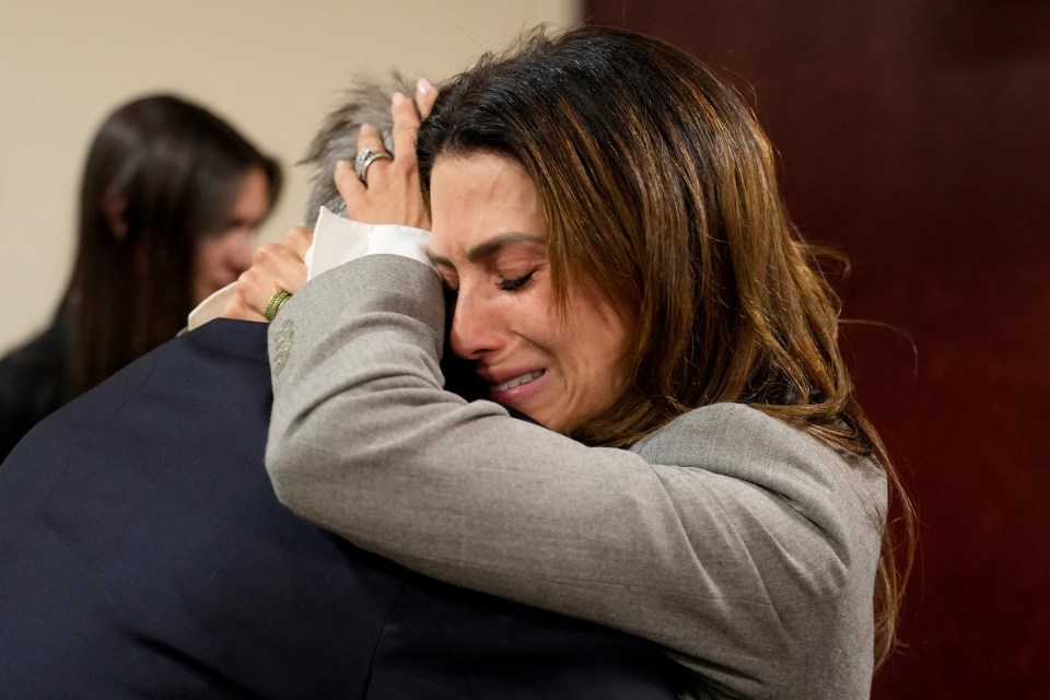 Alec and Hilaria Baldwin embracing during his involuntary manslaughter trial.
