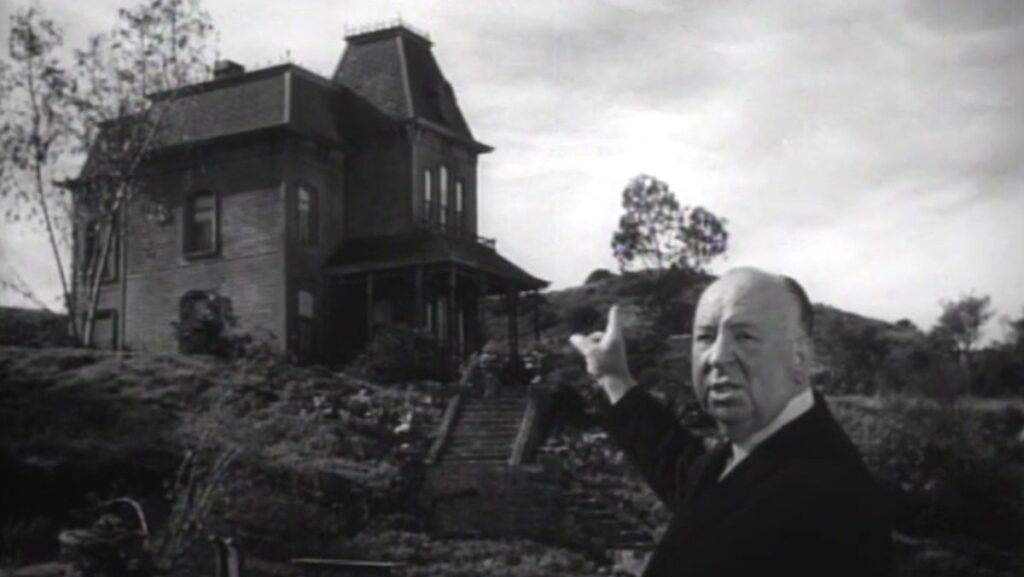 Alfred Hitchcock tours the sets of Psycho in 1960.