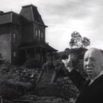 Alfred Hitchcock tours the sets of Psycho in 1960.