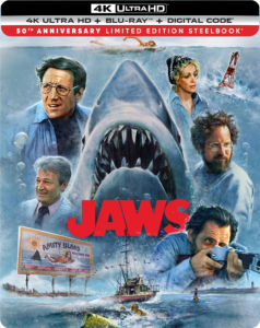 The box art for Jaws 4K Steelbook 50th anniversary release depicts the iconic shark image surrounded by Brody, Ellen, Hooper, Quint, and Mayor Vaughn.
