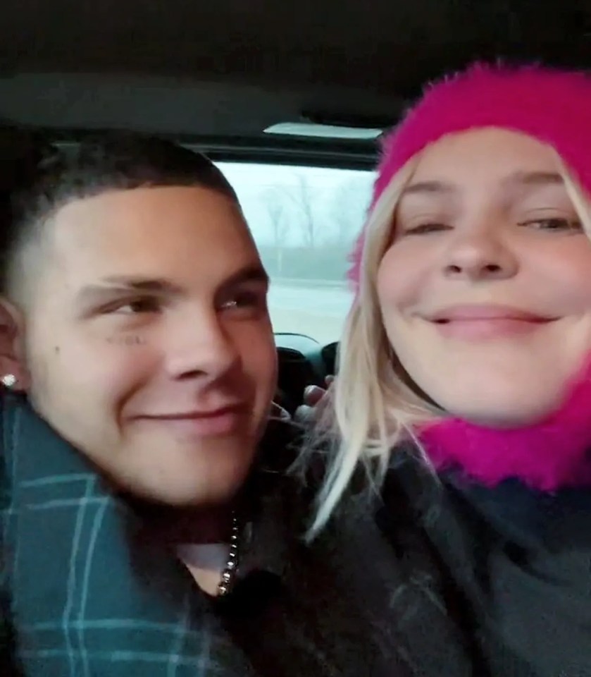 Happy couple in a car.