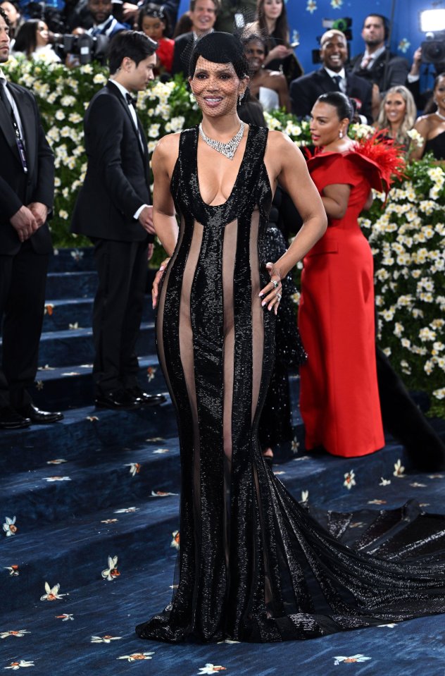 Halle Berry in a sheer black gown at the Costume Institute Benefit Gala.