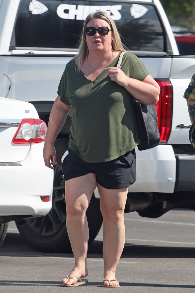 Brooke Thompson, aka "Pumpkin," from "Flavor of Love," walking in a parking lot.