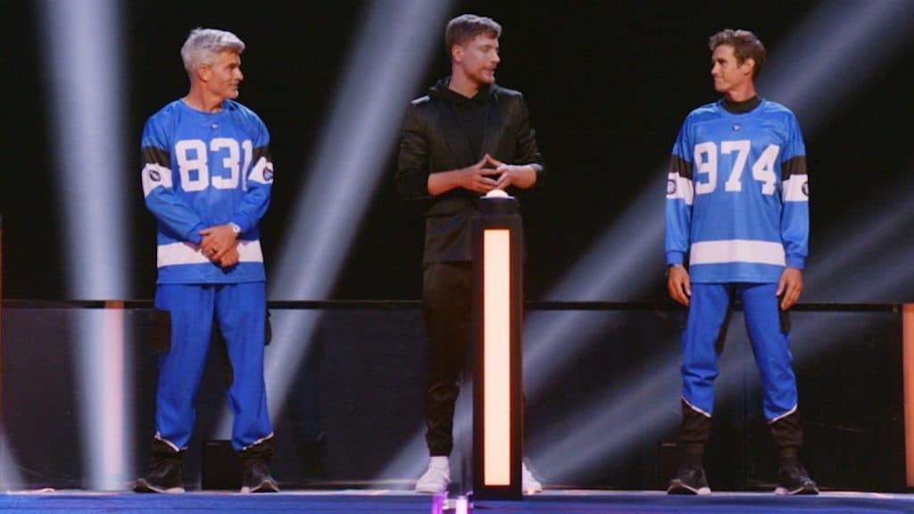 MrBeast with two contestants on the set of Beast Games Season 1.