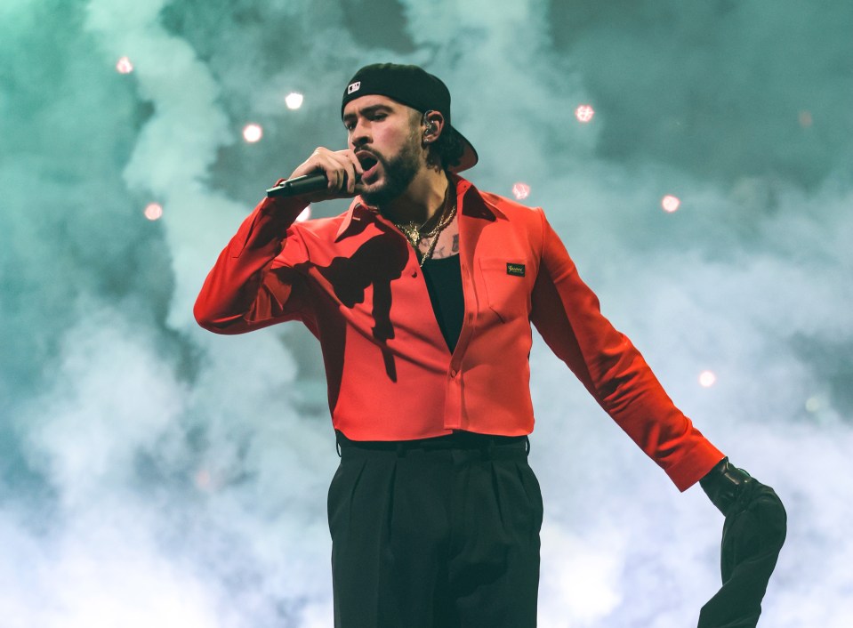 Bad Bunny performing on stage.