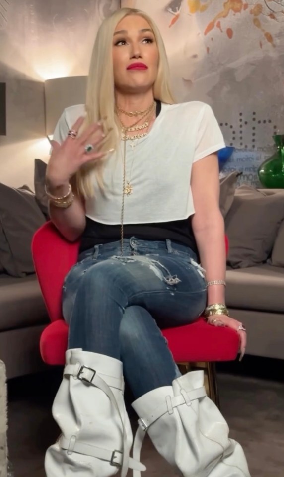 Gwen Stefani sitting and talking.