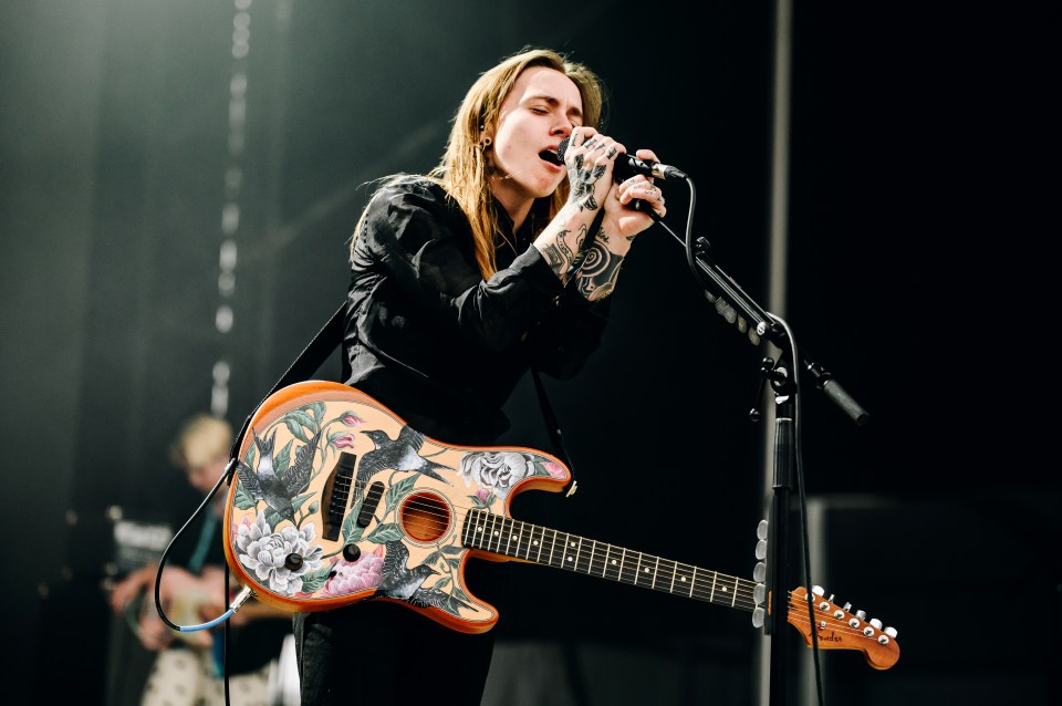 Julien Baker performing at a music festival.