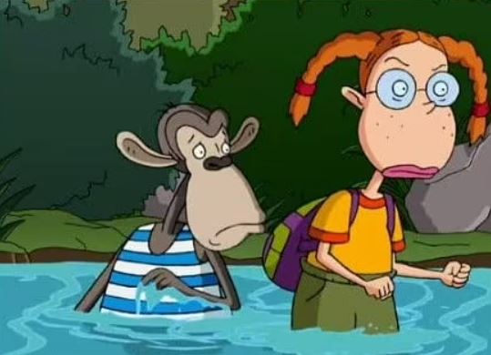 Illustration of Debbie Thornberry and Darwin from The Wild Thornberrys wading in a stream.