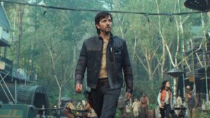 Cassian Andor walking through the Ravin IV base