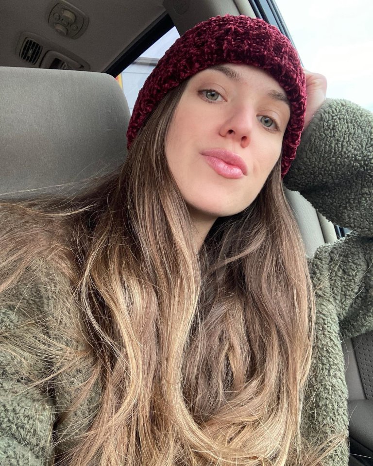 Selfie of Tess Taylor wearing a burgundy beanie.