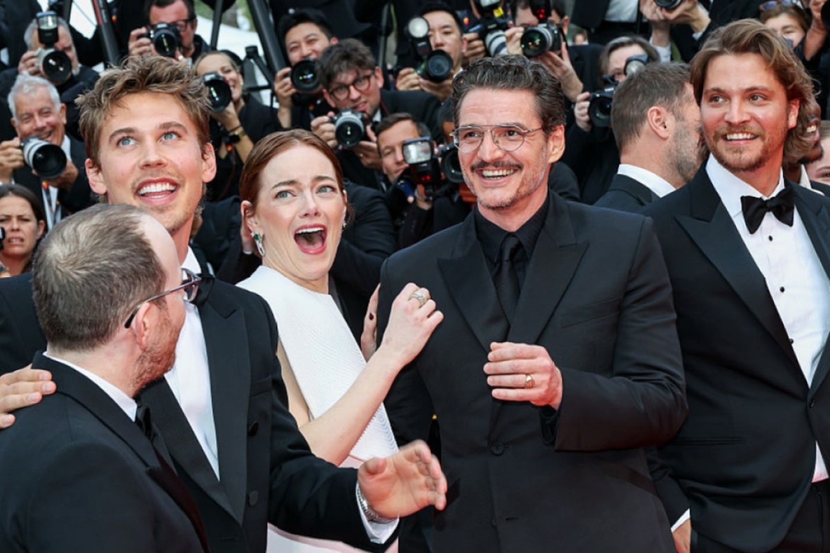 emma-stone-faces-bee-attack-on-cannes-red-carpet-in-buzzworthy-moment-group