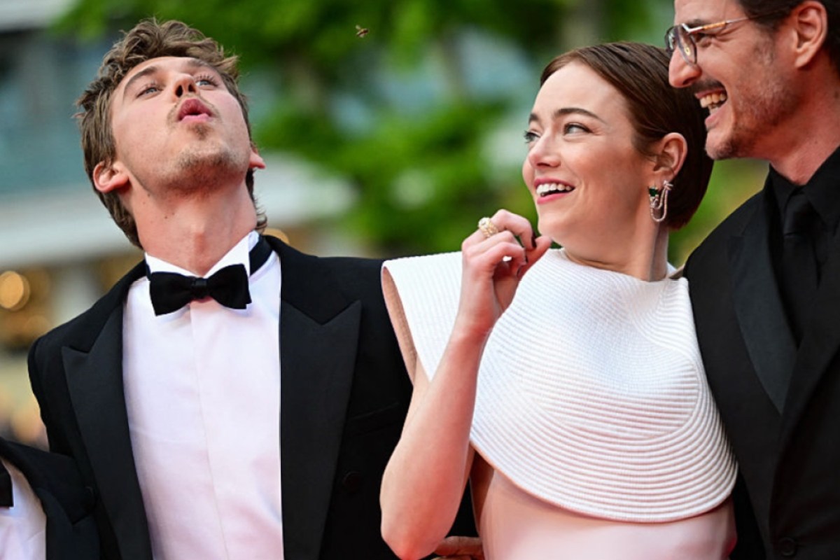 emma-stone-faces-bee-attack-on-cannes-red-carpet-in-buzzworthy-moment-blow