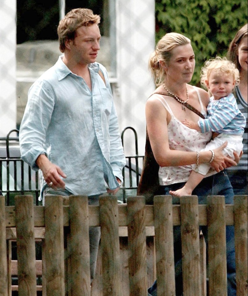 Kate Winslet, her ex-husband Jim Threapleton, and their daughter Mia in a park.
