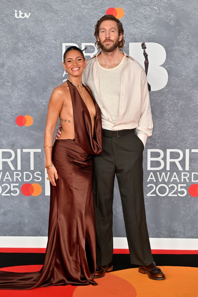 Vick Hope and Calvin Harris at the BRIT Awards 2025.