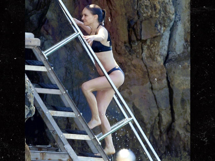 0519-Natalie-Portman-Cliff-Jumping-At-The-Hotel-du-Cap-Eden-Roc-In-Cannes-primary-3