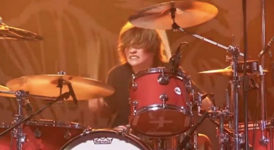 Oliver Shane Hawkins playing drums at a Foo Fighters concert.