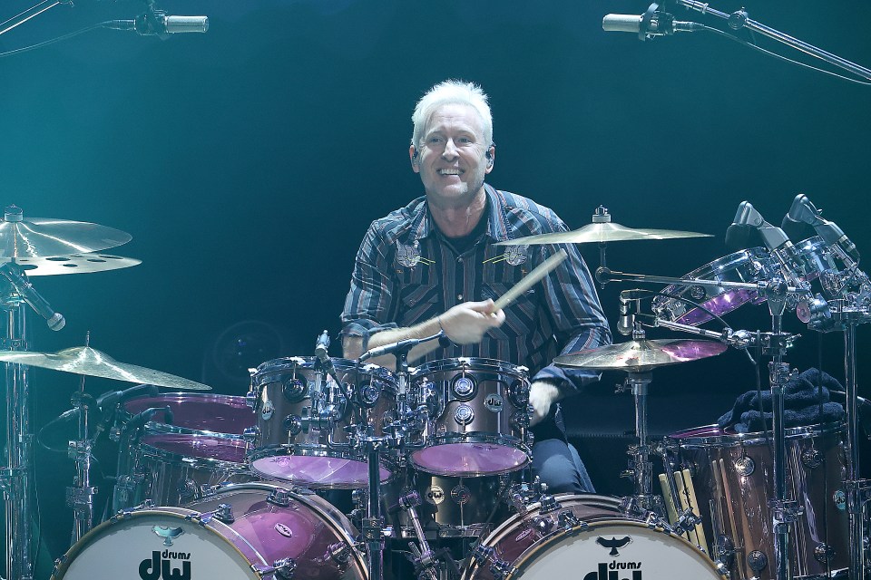 Josh Freese drumming at a Foo Fighters concert.