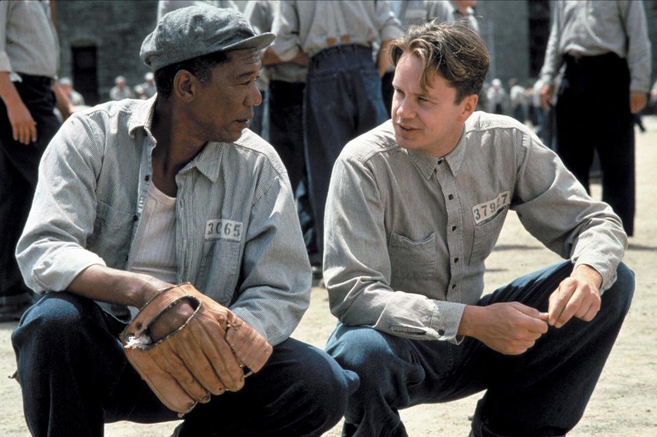 Still from The Shawshank Redemption showing Morgan Freeman and Tim Robbins in prison uniforms.
