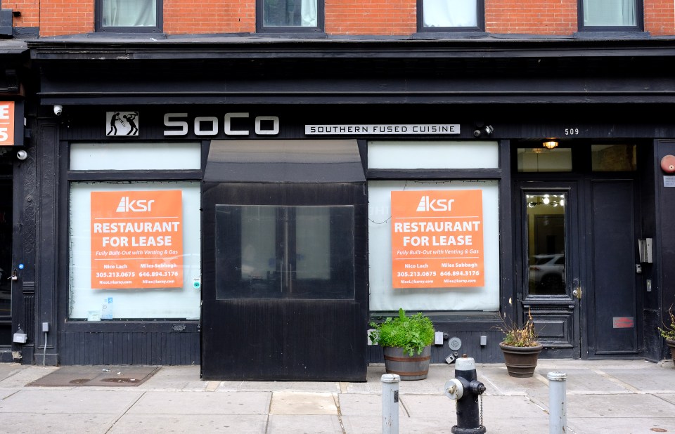 Photo of SoCo, a closed Southern fused cuisine restaurant in Brooklyn, New York, with "Restaurant for Lease" signs in the windows.