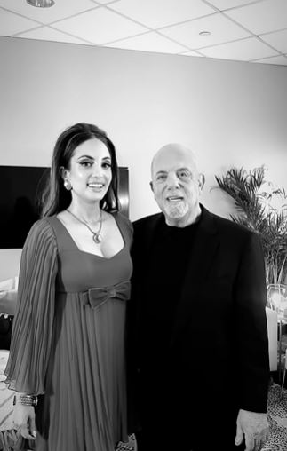 Black and white photo of Billy Joel and his daughter Alexa.