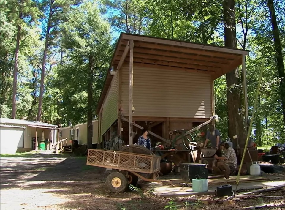 Phil Robertson and Miss Kay's Louisiana estate, showing a shed and outbuildings.