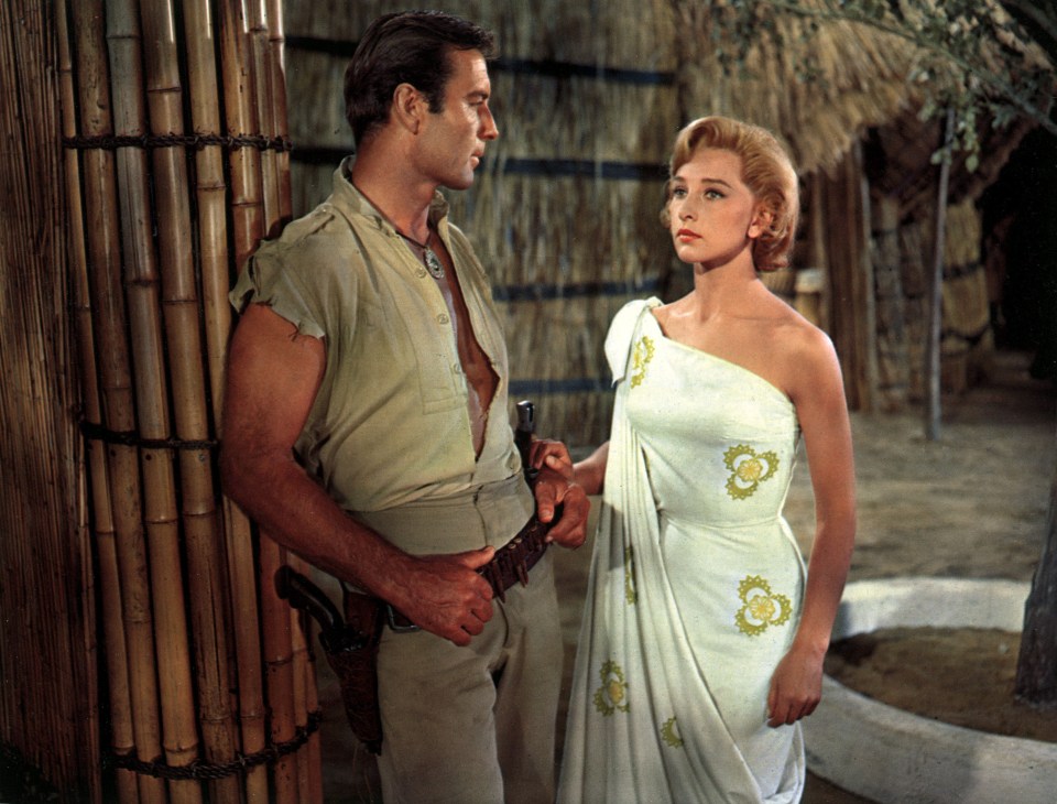 Scene from the film *Watusi* showing David Farrar and Taina Elg.