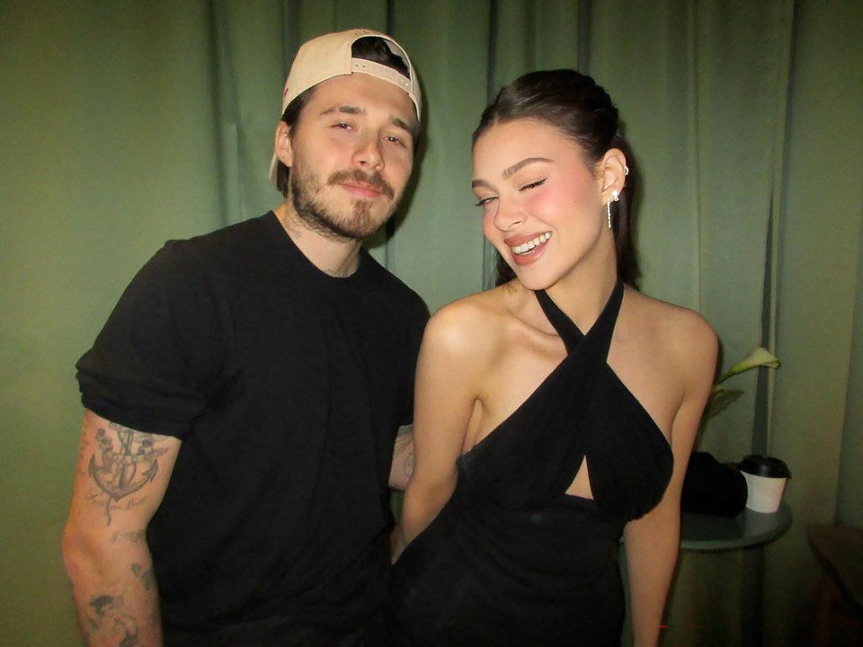 Brooklyn Beckham and Nicola Peltz Beckham at an event.