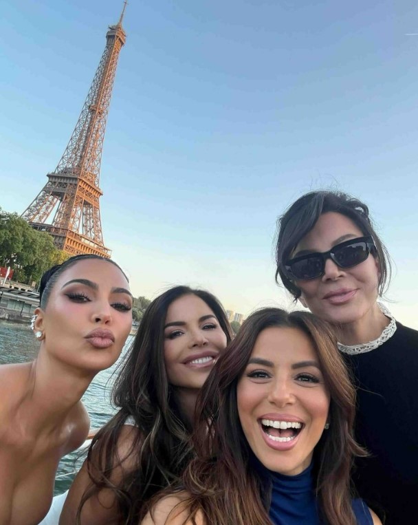 Kim Kardashian, Kris Jenner, Lauren Sanchez, and Eva Longoria selfie in Paris with the Eiffel Tower in the background.