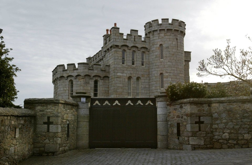 Manderley Castle, formerly Ayesha Castle, with a dark gate.