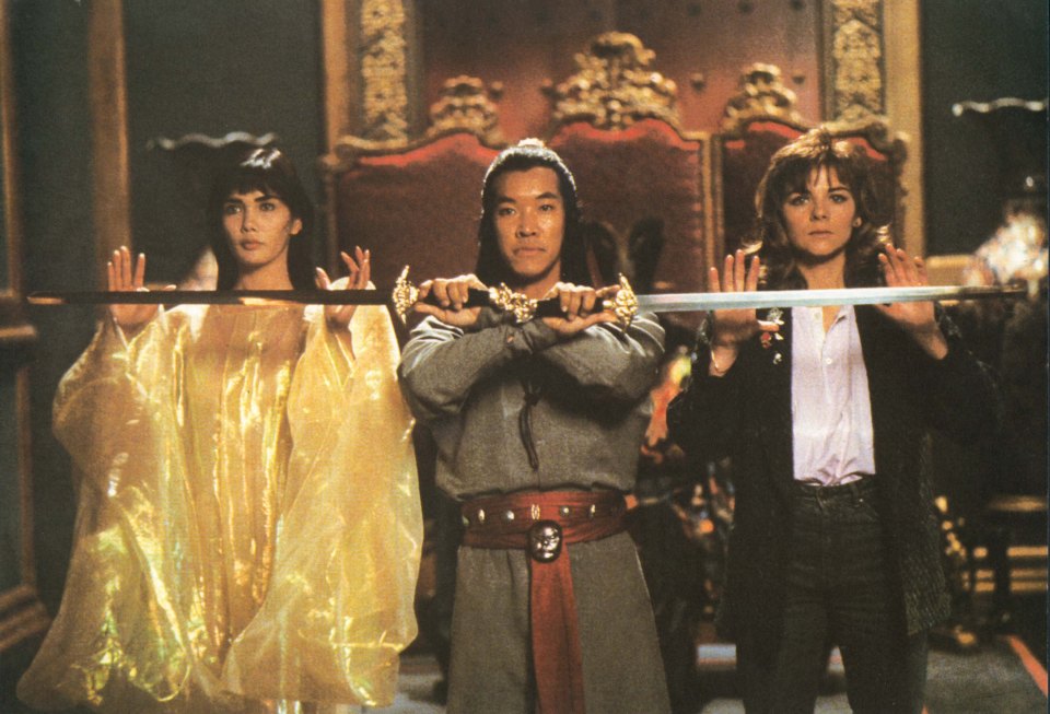 Still from *Big Trouble in Little China* showing Suzee Pai, Peter Kwong, and Kim Cattrall.