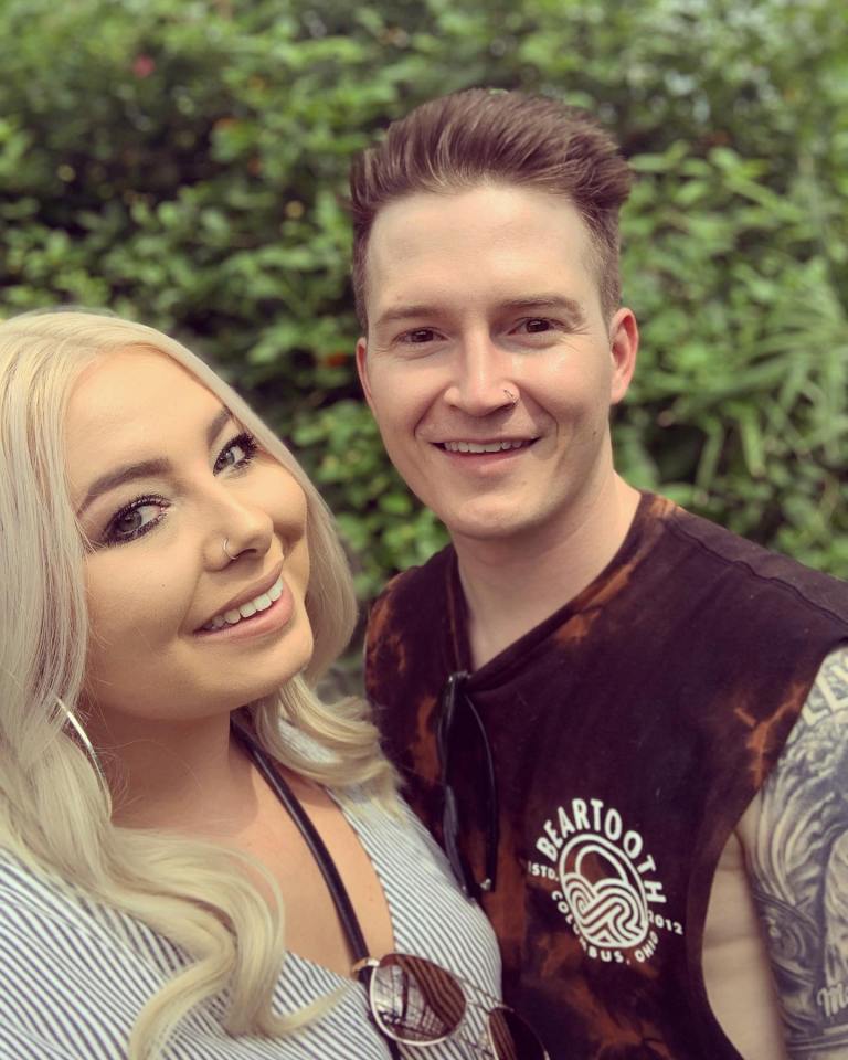 Adam Ramey, lead singer of Dropout Kings, with his partner.