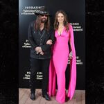 Elizabeth-Hurley-and-Billy-Ray-Cyrus-getty-1