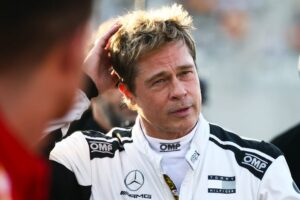 Brad Pitt plays Sonny Hayes, a driver of the fictional Apex APXGP F1 team in the upcoming "F1" movie directed by Joseph Kosinski, gets ready for filming a scene ahead Formula 1 Abu Dhabi Grand Prix at Yas Marina Circuit on Dec. 8, 2024, in Abu Dhabi, United Arab Emirates.